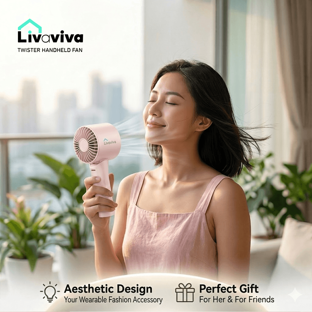 Woman enjoying a cool breeze from a pink Livaviva handheld fan on a balcony.